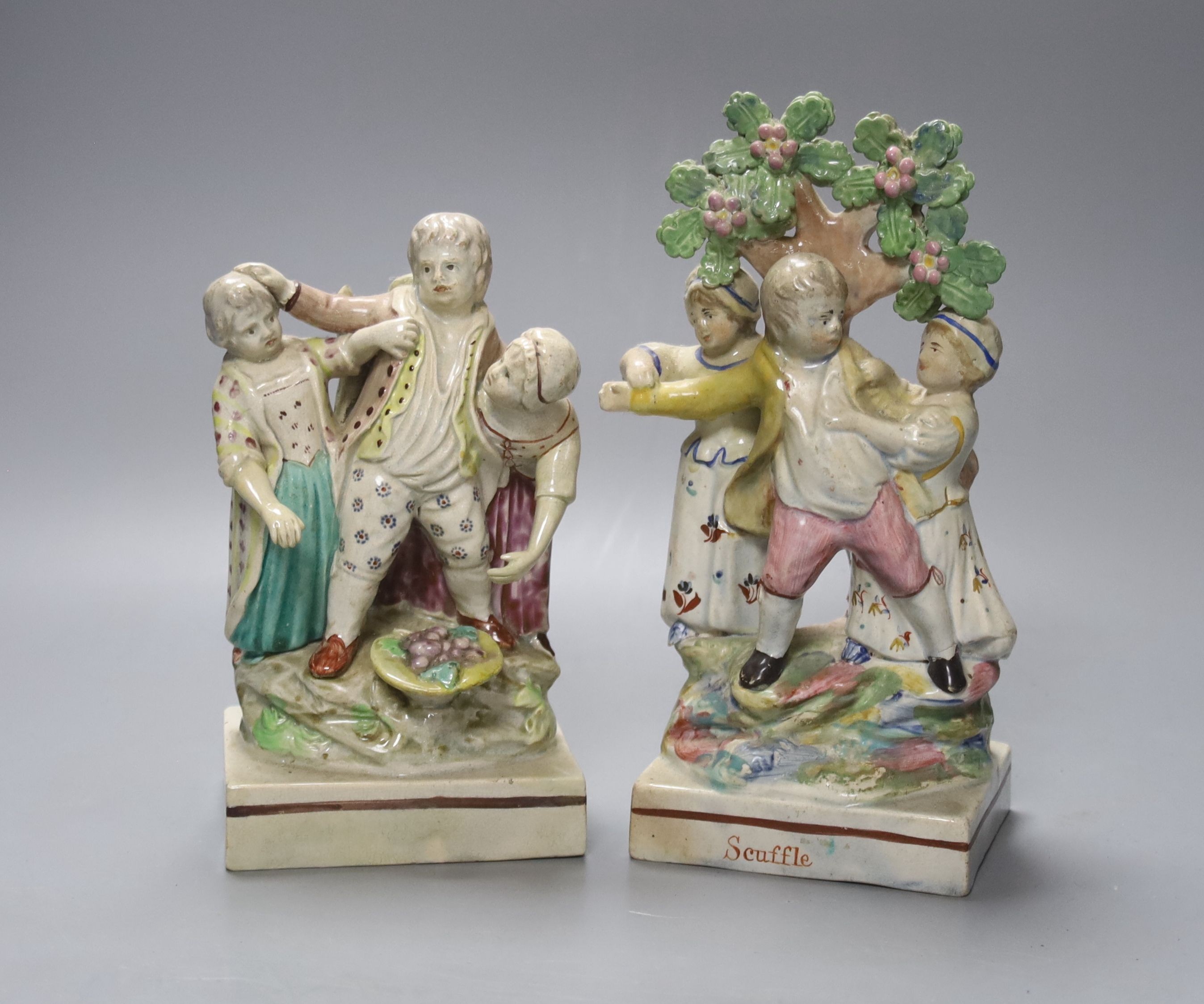 An early 19th century Ralph Wood Staffordshire group 'No Contest', 17.5cm and a similar bocage group, 'Scuffle', 21cm